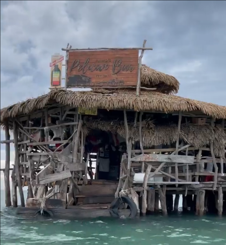 Bamboo rafts with Jamaican flags